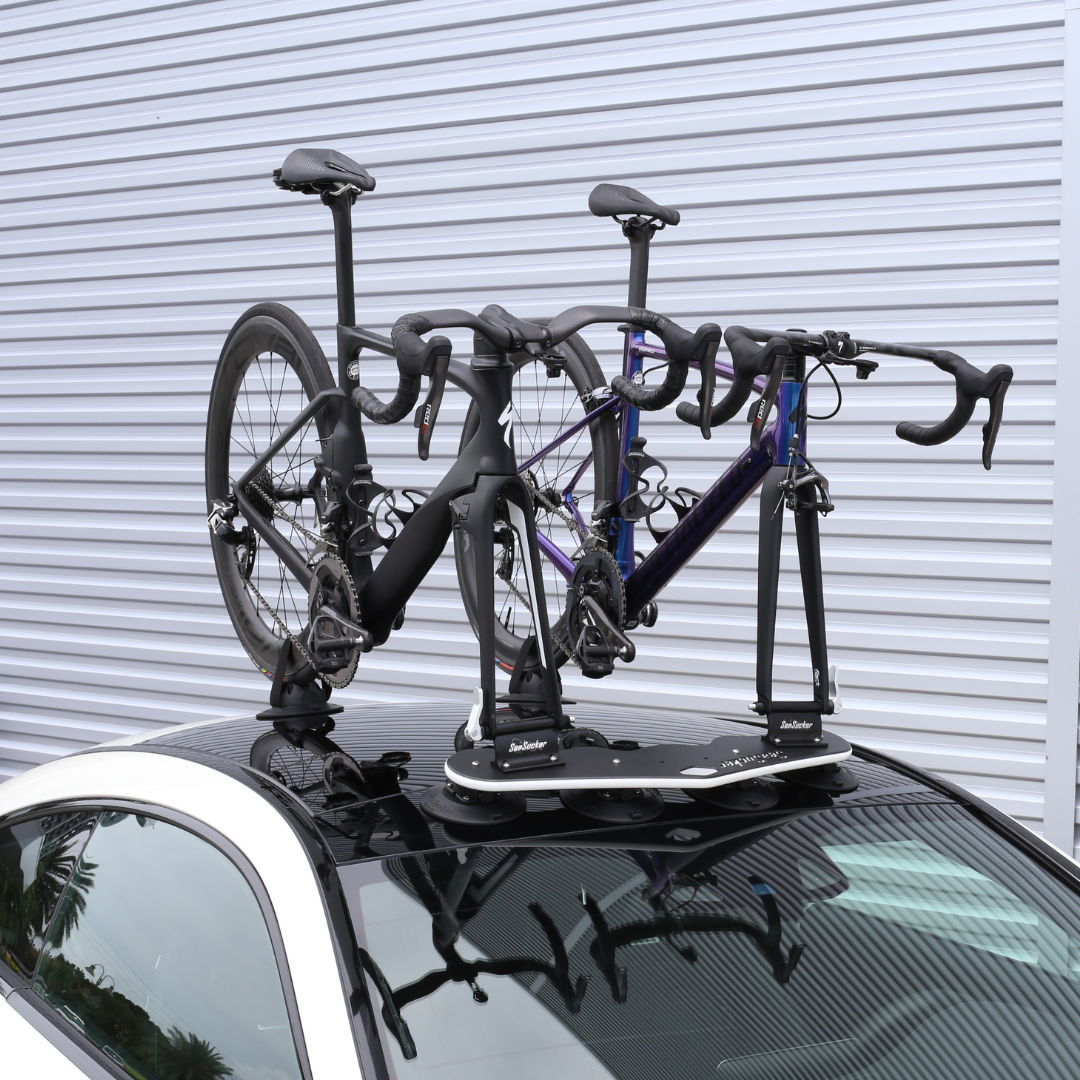 image-all | Bomber - 3 Bikes lifestyle photo of two bikes mounted on car roof