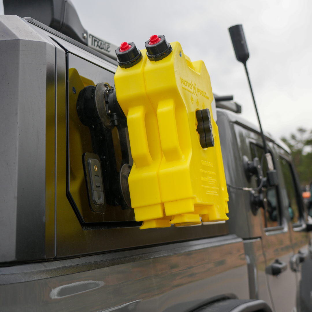 Two Yellow RotopaX Tanks on a SeaSucker Mount