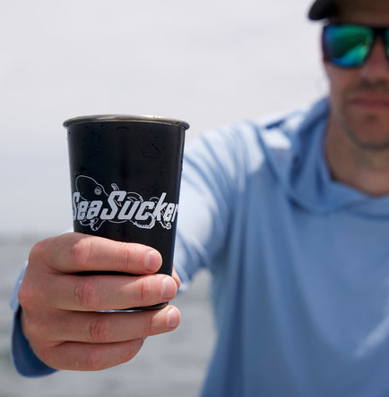 A black SeaSucker Pint Glass