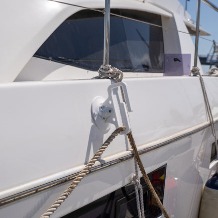 A Dock Line Caddy on the side of a boat
