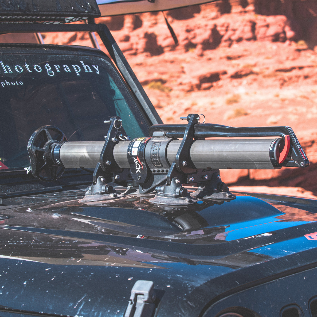All | SeaSucker Hydraulic Jack Mount mounted to hood of Jeep