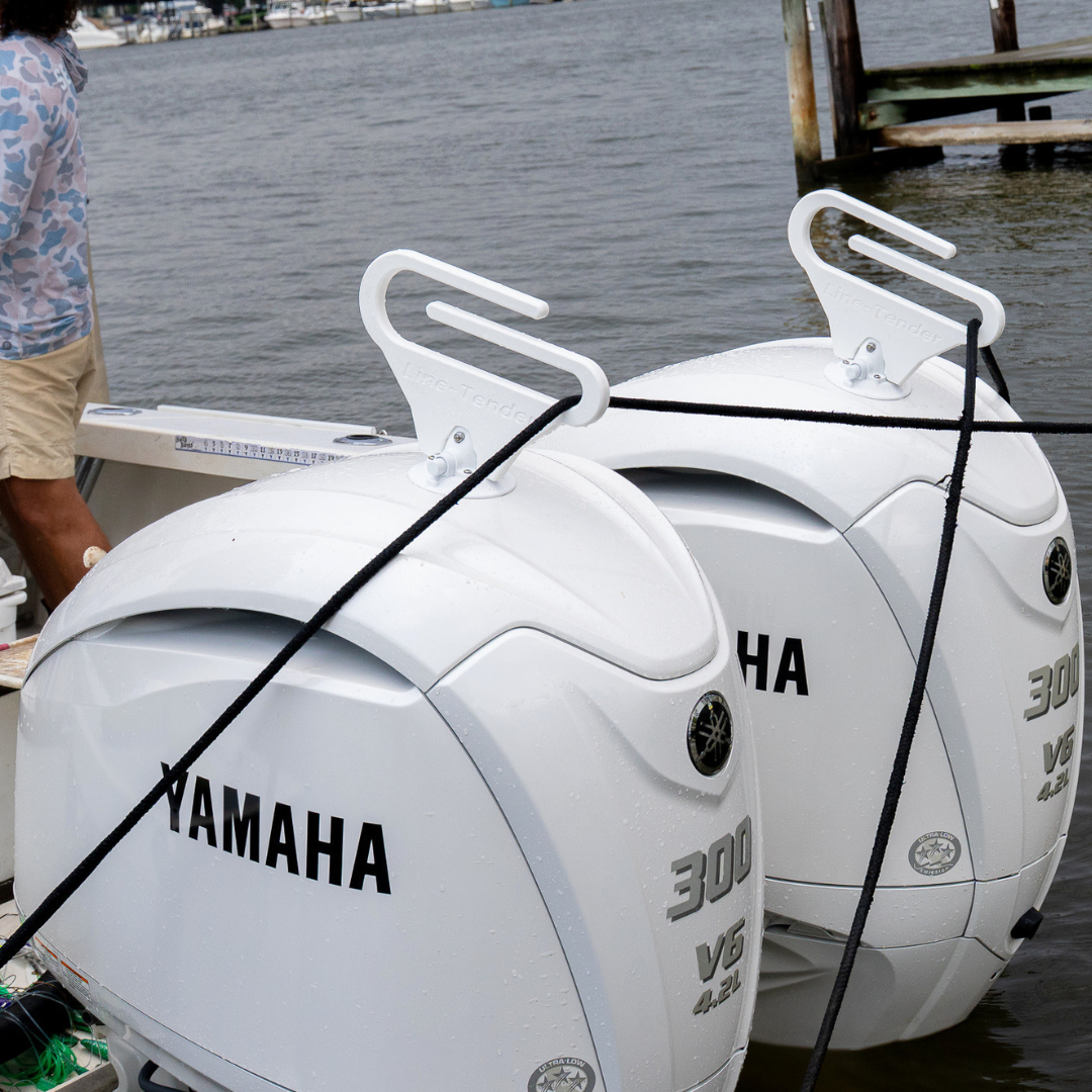 Line Tender: Mount for Outboard Motor Dock Lines image showcasing two Line Tenders on Yamaha engines