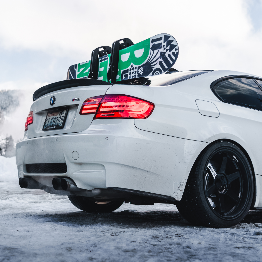 image--all | Pallavicini Ski Rack with snowboard on the back of a BMW
