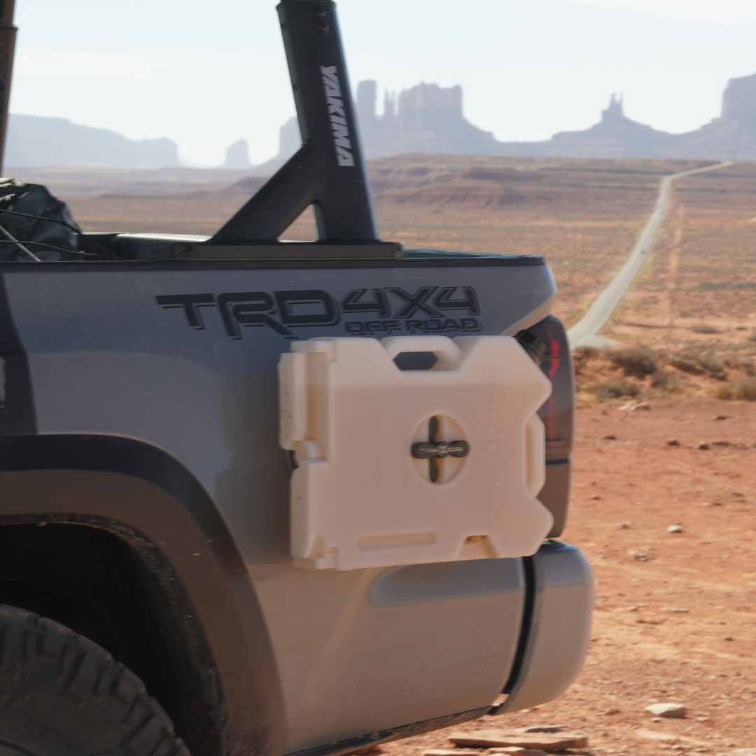 SeaSucker RotopaX Tank Holder mounted to truck panel