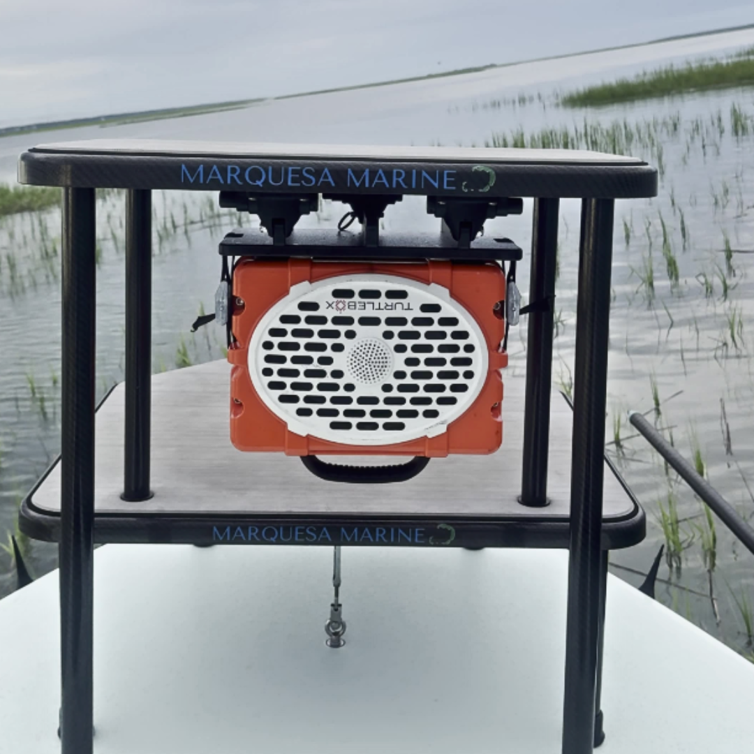 image--black--with 3' straps | Turtlebox Mount lifestyle photo of black variant on the boat